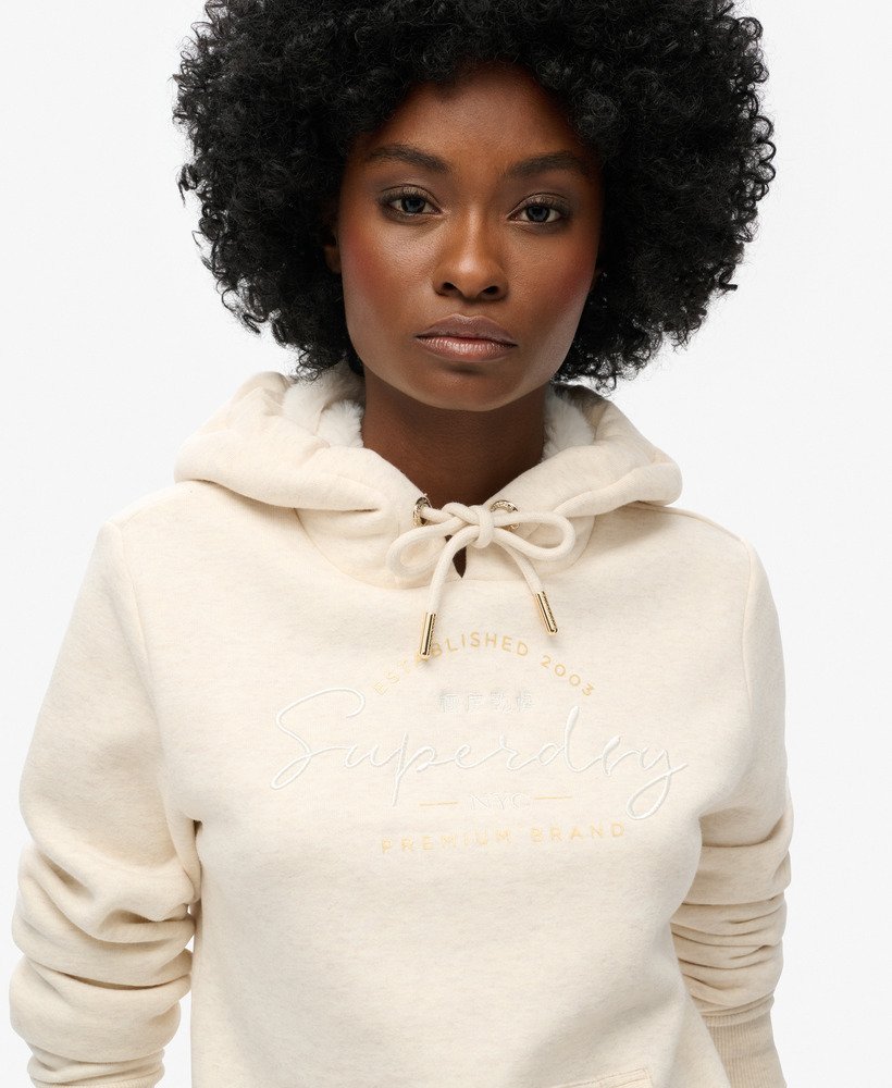 moletom com capuz luxuous metallic logo na cor oat cream mescl