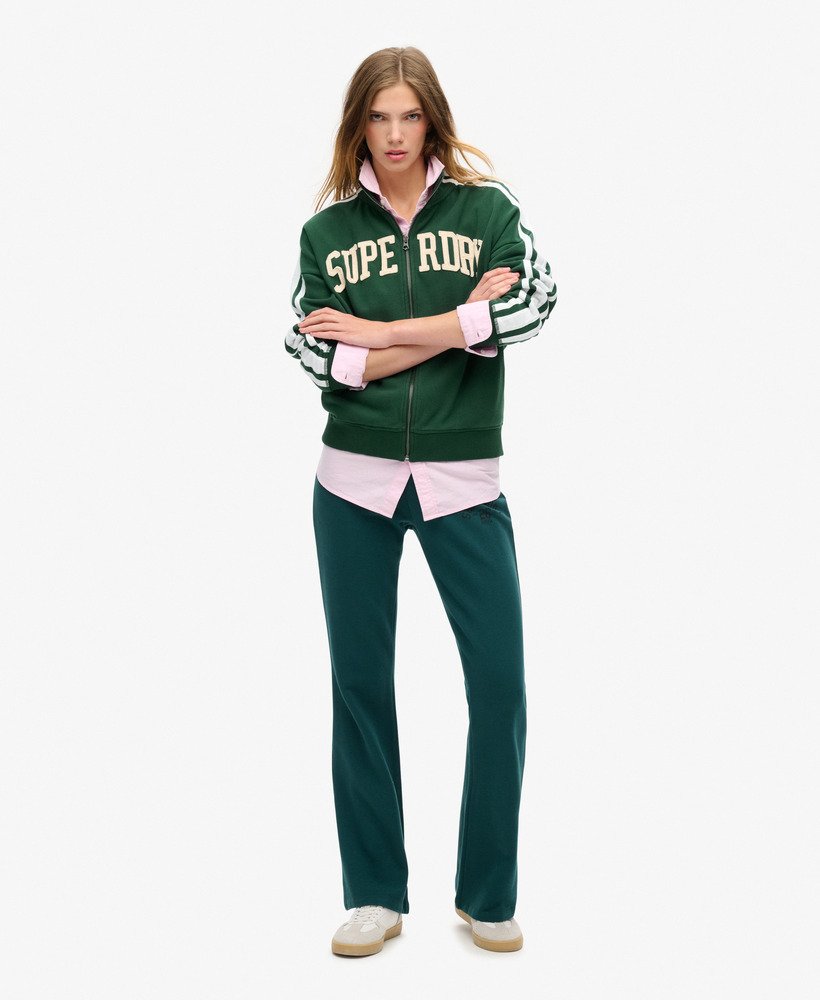 jaqueta esportiva folgada com zíper e apliques da athletic essentials na cor verde esmalte.