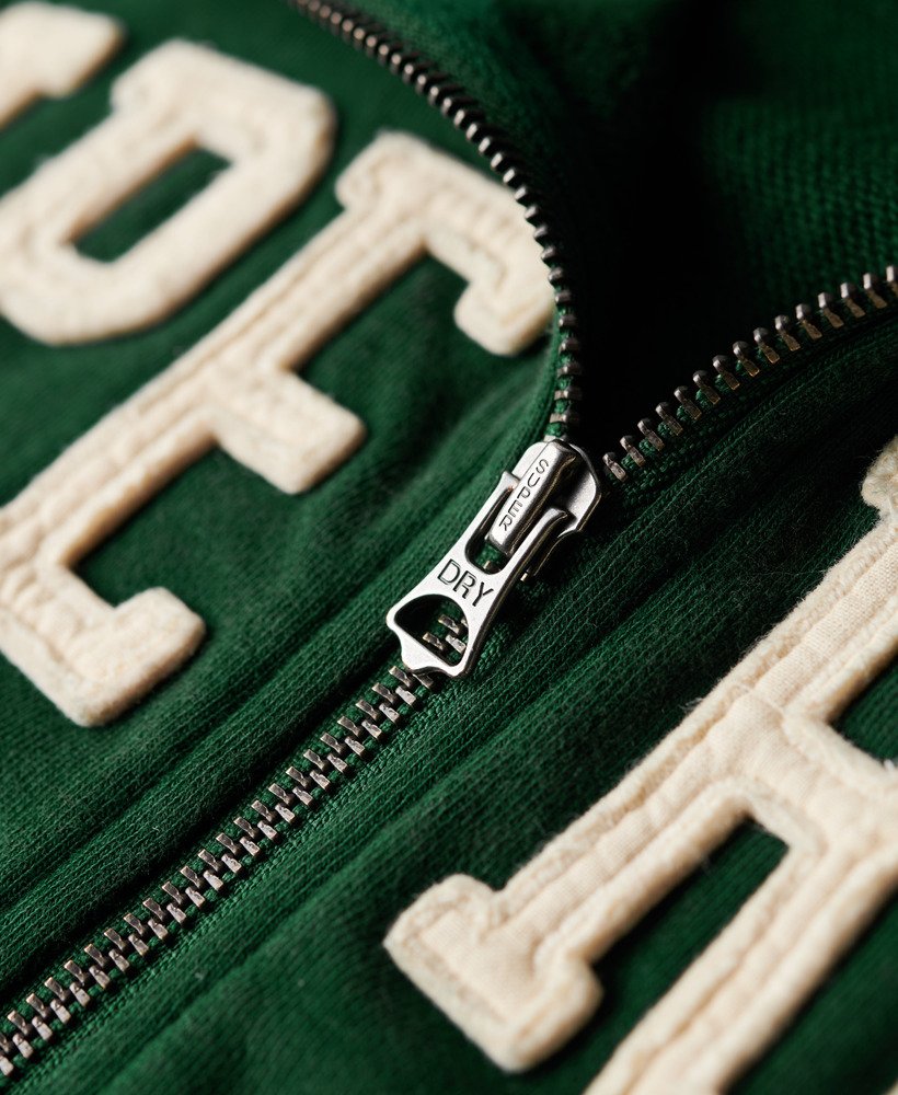 jaqueta esportiva folgada com zíper e apliques da athletic essentials na cor verde esmalte.