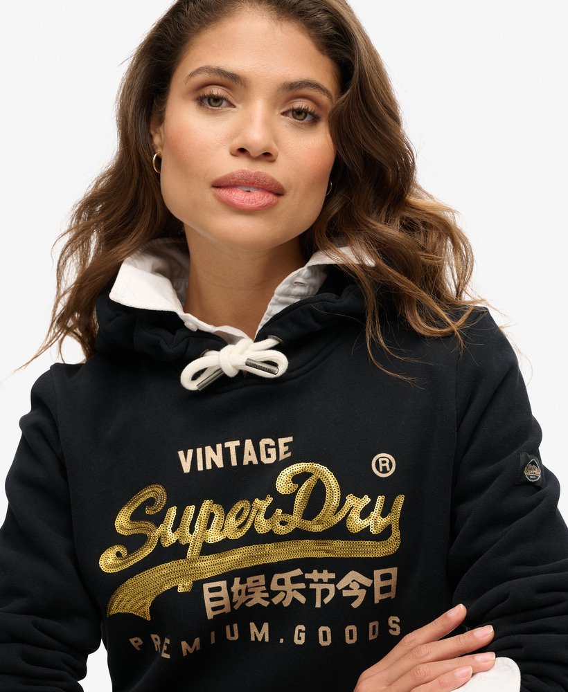 moletom com capuz e estampa vintage com logo bordado na cor preto jato