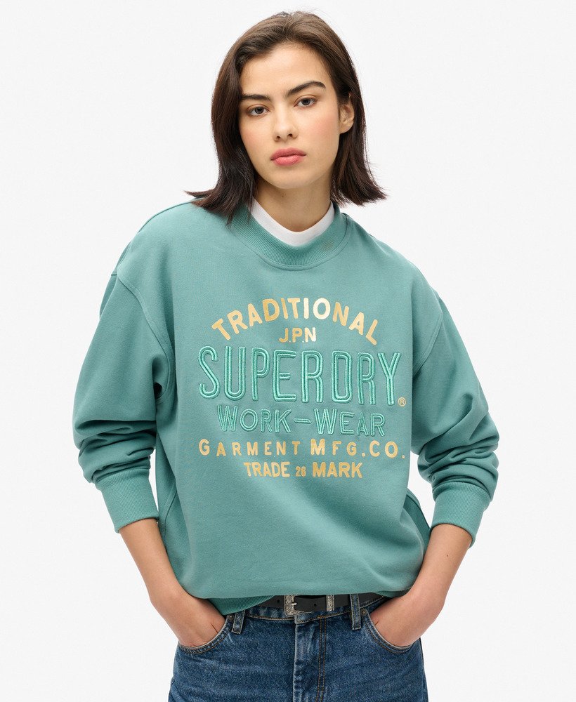 moletom folgado luxe metallic em verde-azulado.