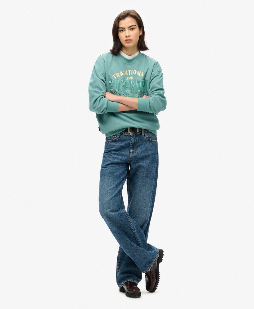 moletom folgado luxe metallic em verde-azulado.