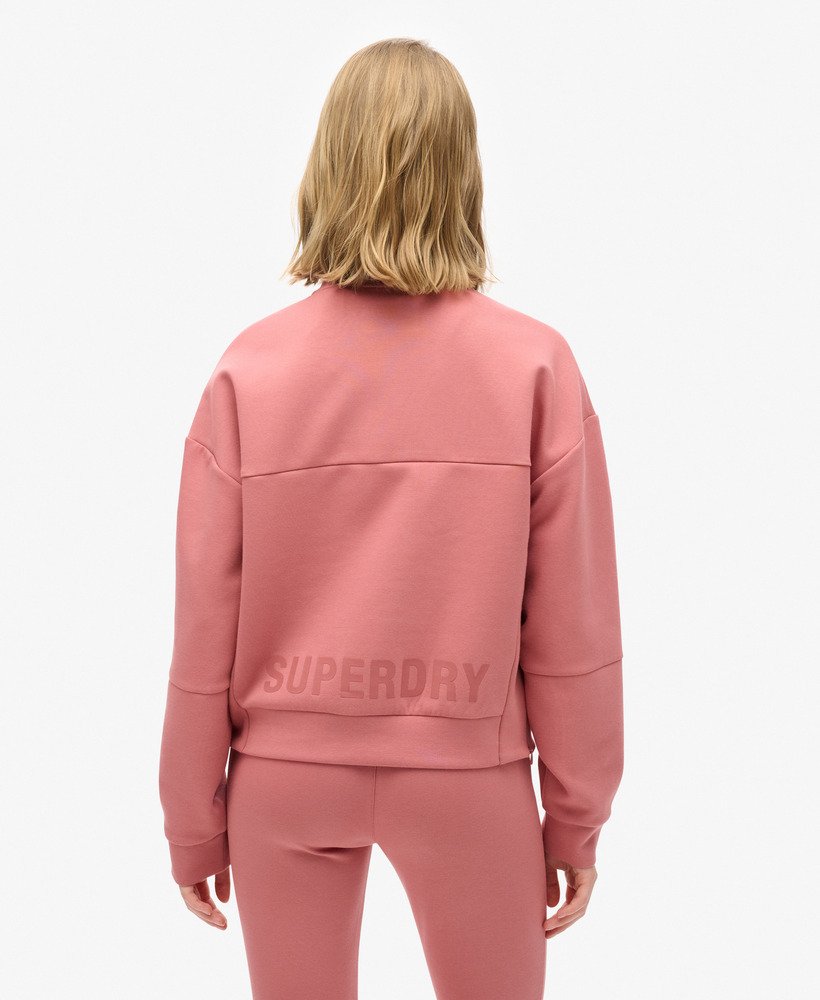 moletom sport tech relaxed com meio zíper na cor rosa murcha