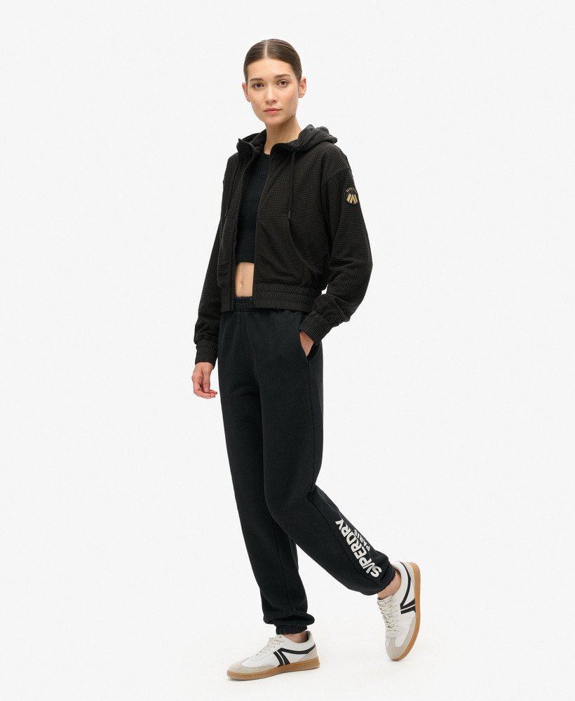 casaco com capuz e zíper sport tech grid fleece na cor preta.