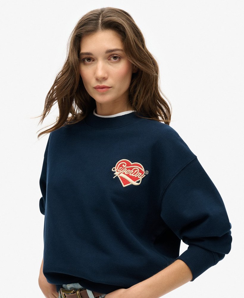 suéter workwear bordado caimento solto gola redonda na cor azul marinho mais intenso