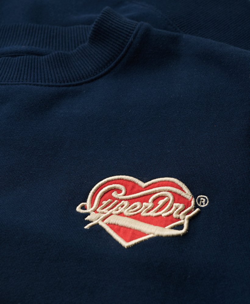 suéter workwear bordado caimento solto gola redonda na cor azul marinho mais intenso