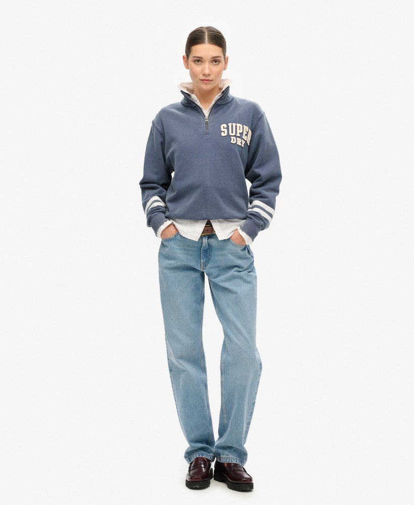 moletom athletic essentials com meio zíper e apliques na cor azul marinho.