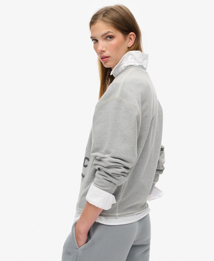 moletom cropped folgado athletic essentials na cor cinza mesclado.