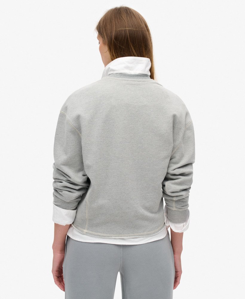 moletom cropped folgado athletic essentials na cor cinza mesclado.