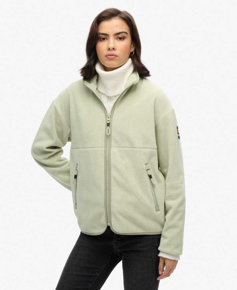 casaco polar active com fecho de correr completo na cor verde-sálvia.