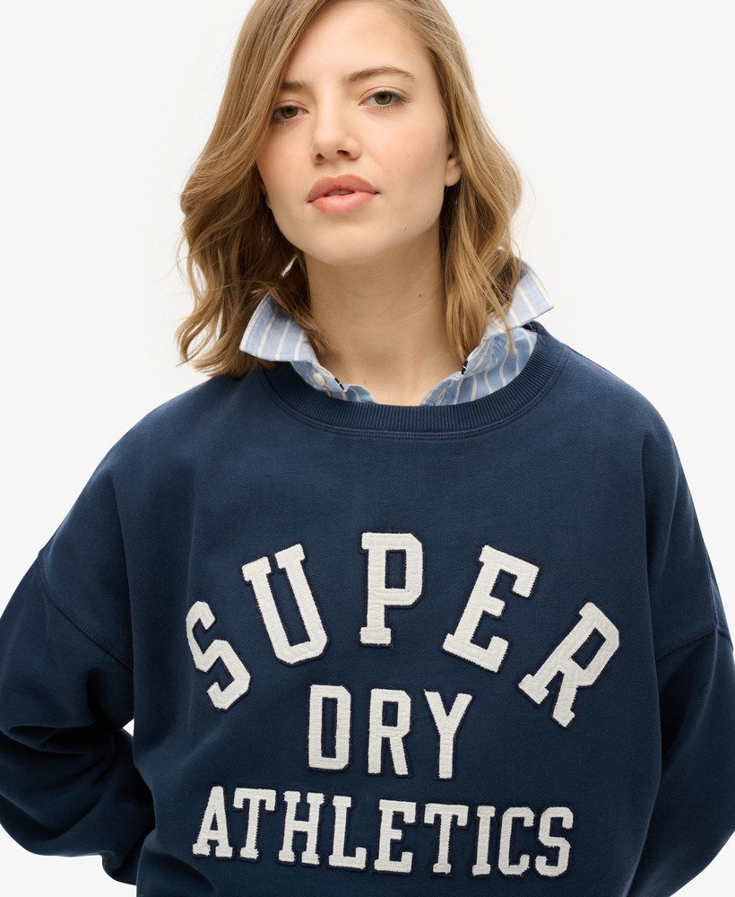moletom athletic essentials relaxed applique na cor azul marinho mais intenso.