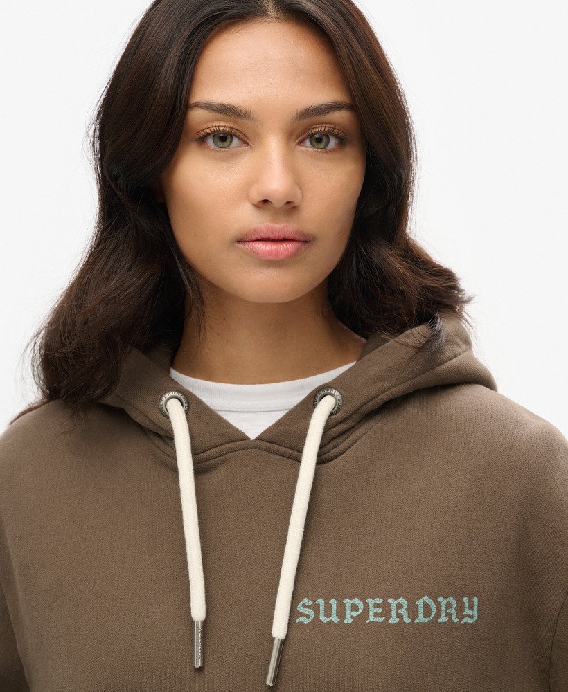 moletom oversized com estampa de tatuagem na cor cáqui escuro.