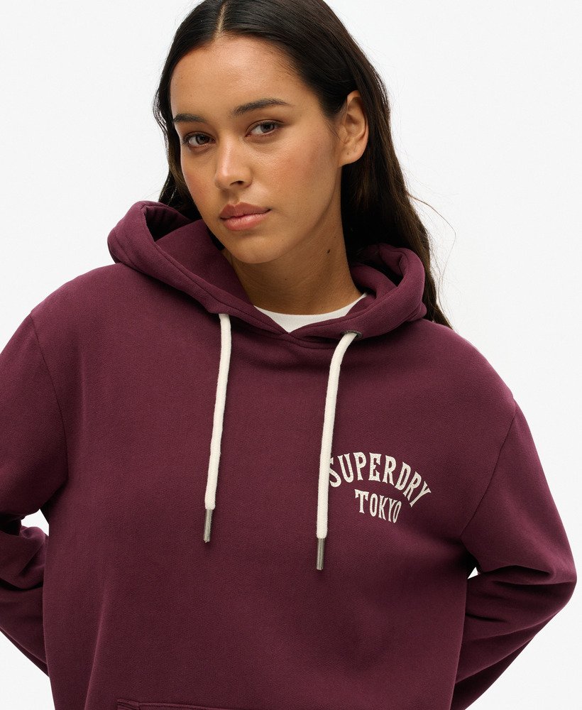 moletom com capuz oversized com estampa de tatuagem nas costas na cor roxa figo