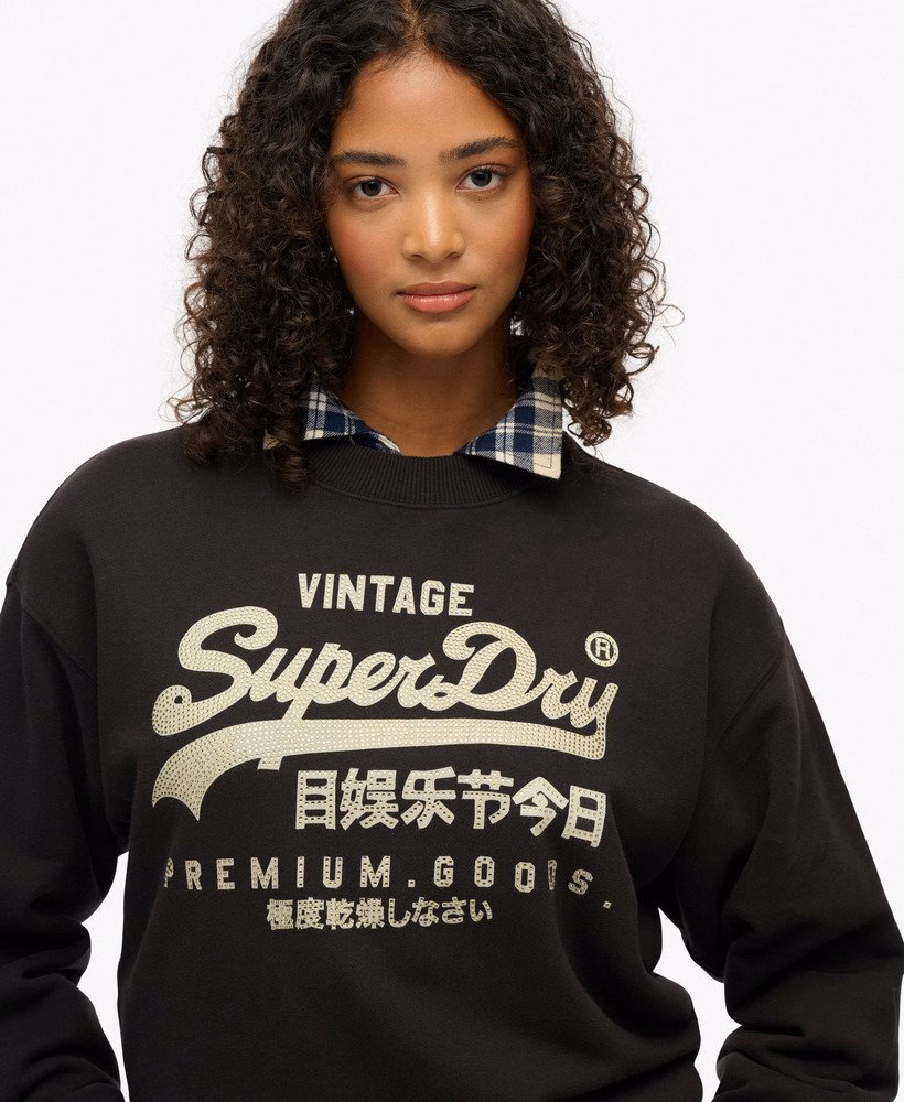 Moletom folgado com gola redonda e logo vintage bordado