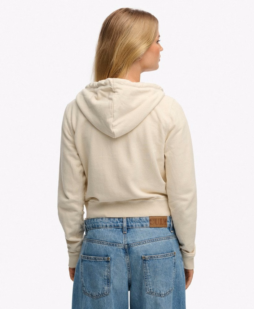 Moletom cropped com zíper, estilo esportivo e descontraído.