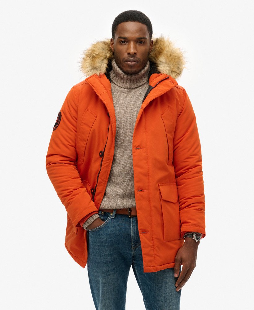 parka com capuz everest em pele sintética cor abóbora.