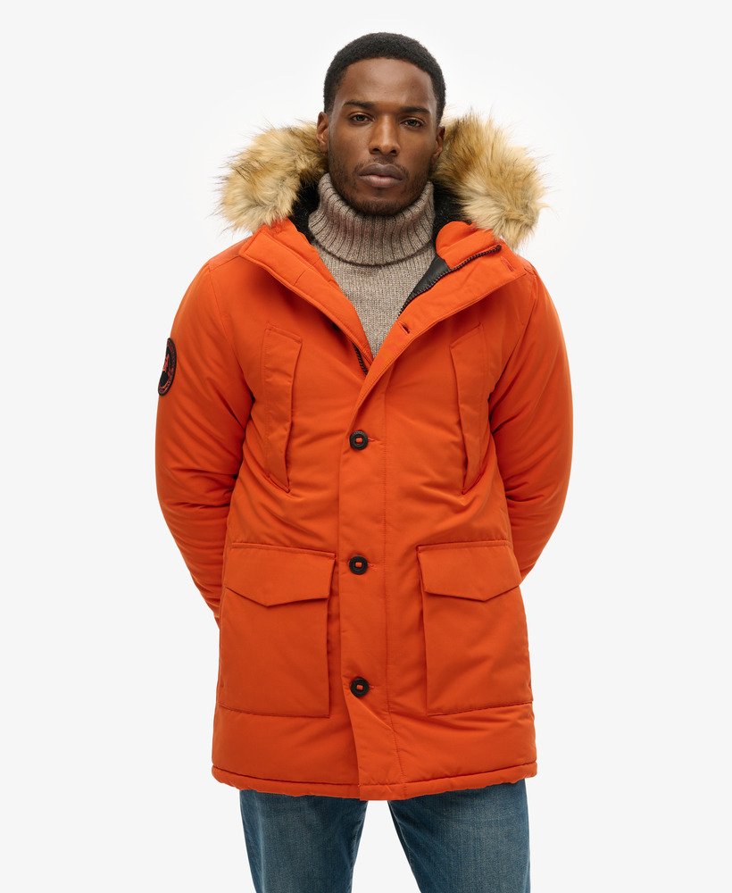 parka com capuz everest em pele sintética cor abóbora.