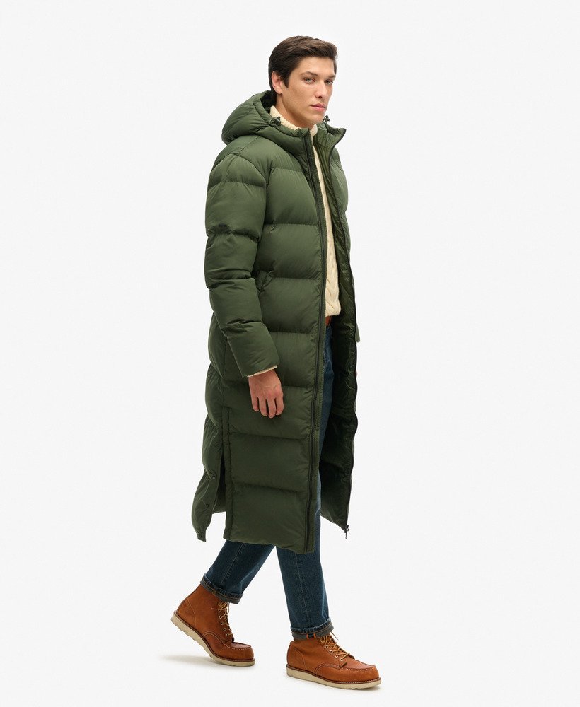 casaco puffer extra longo em bolsa de lona