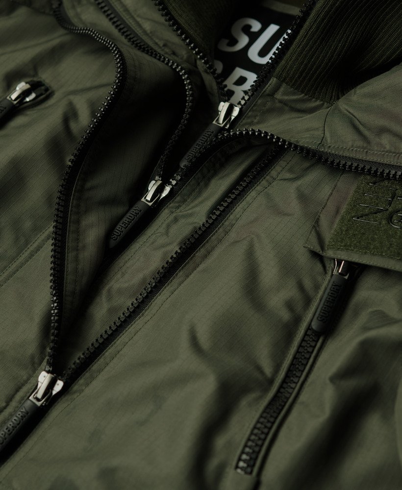jaqueta corta-vento mountain sd na cor verde-oliva surplus goods