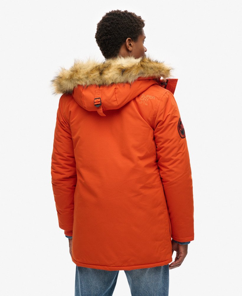 casaco parka com capuz everest em pele sintética na cor laranja abóbora.