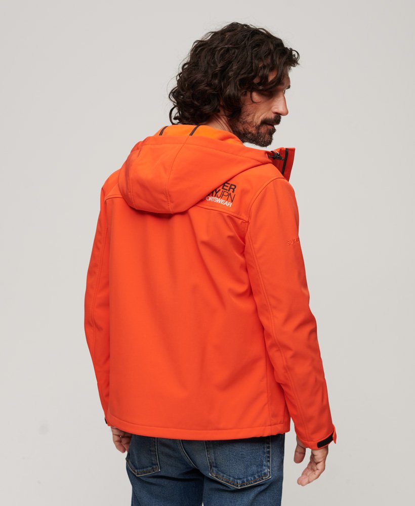 jaqueta softshell com capuz e forro de fleece em laranja vibrante