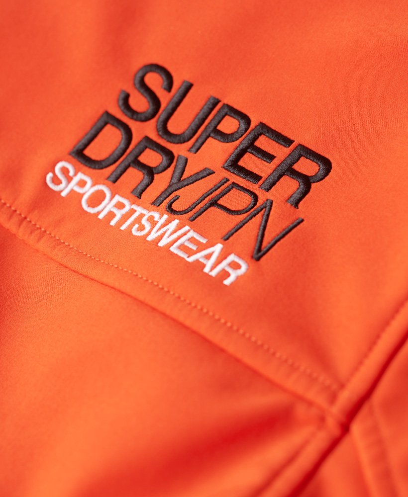 jaqueta softshell com capuz e forro de fleece em laranja vibrante