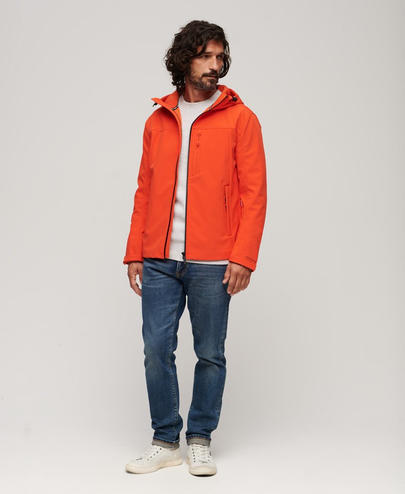 jaqueta softshell com capuz e forro de fleece em laranja vibrante