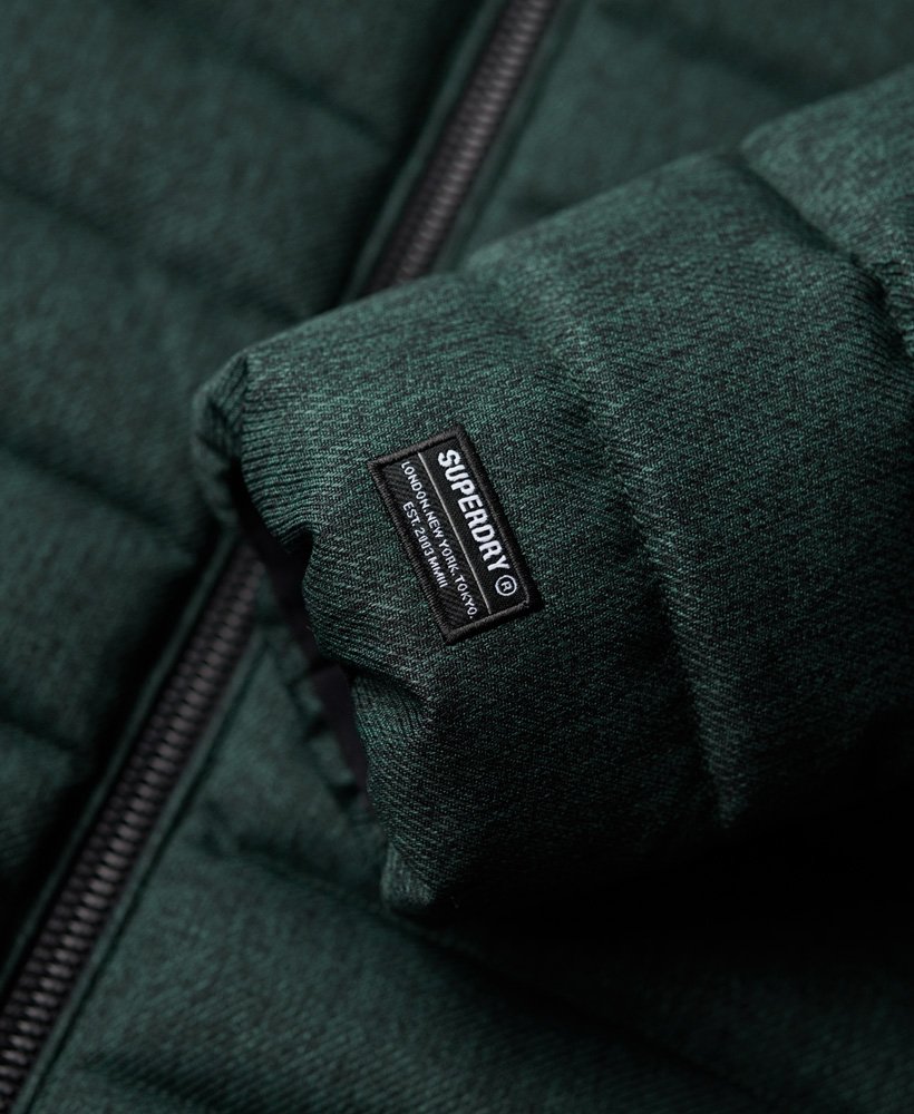 jaqueta fuji herringbone com capuz na cor verde escuro academy.