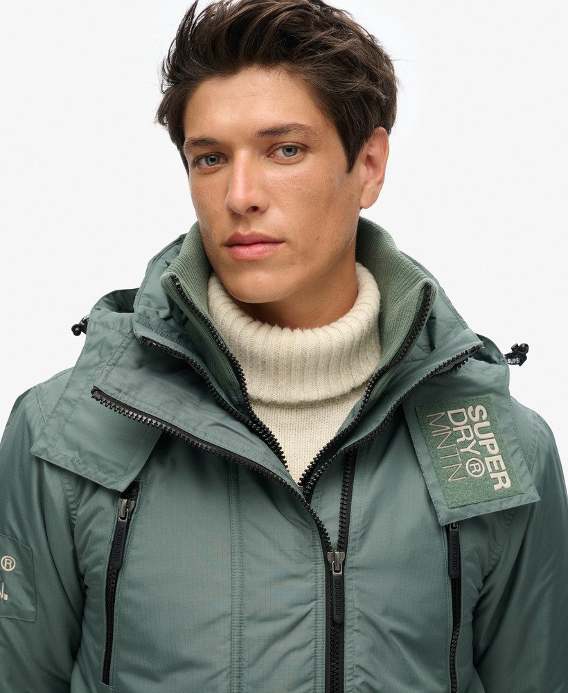 jaqueta corta-vento hooded mountain sd na cor cáqui laurel