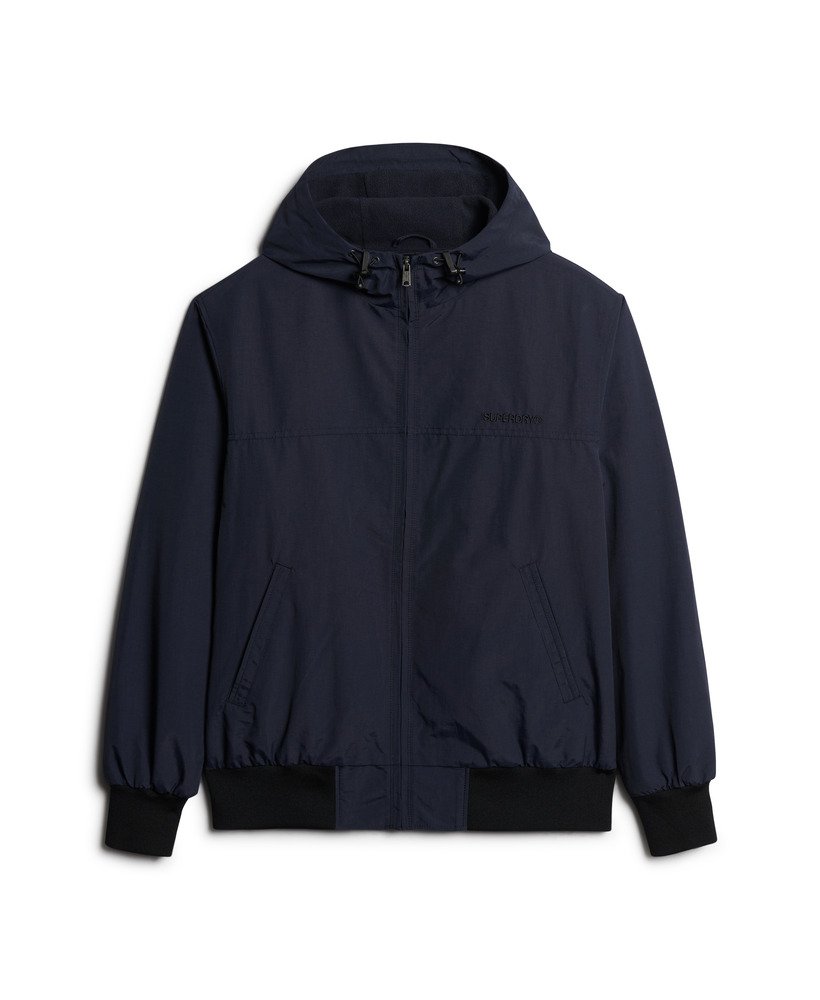 jaqueta bomber com capuz em nylon excedente na cor azul marinho eclipse.