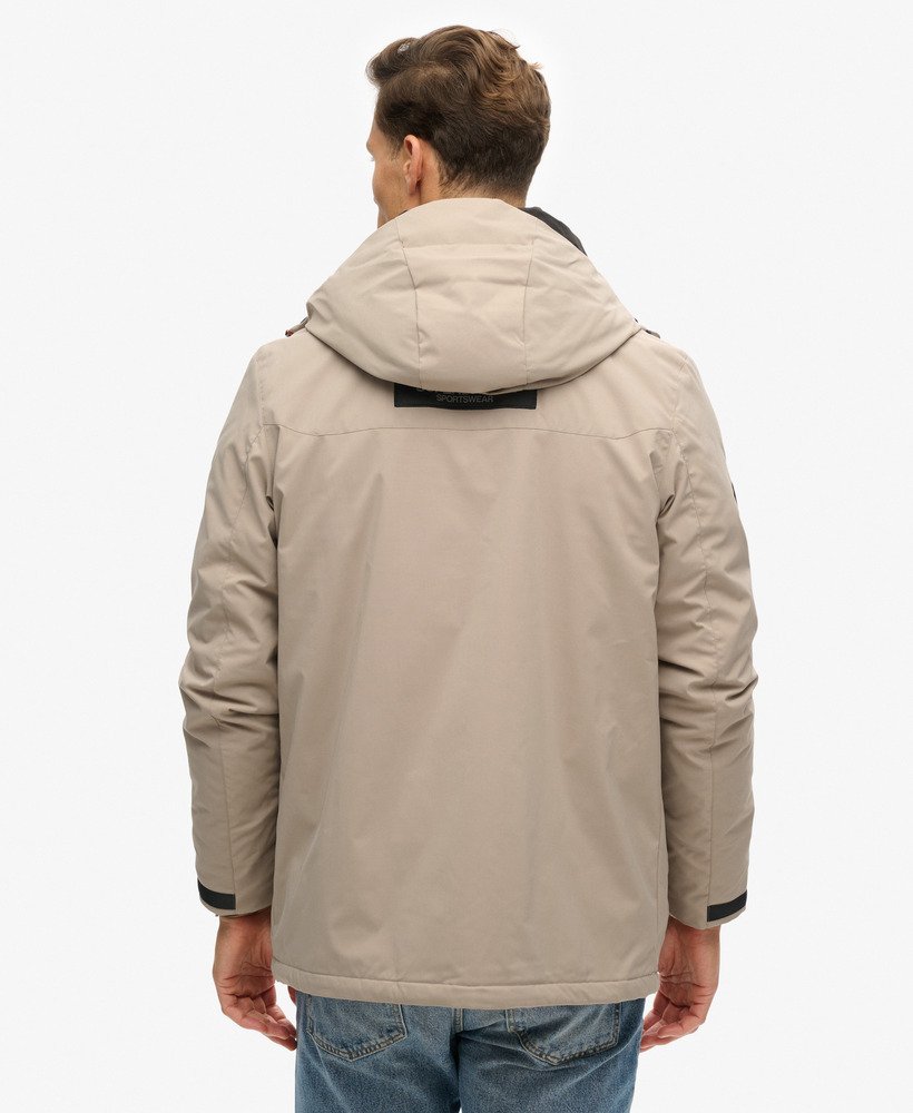 jaqueta parka corta-vento com capuz city em tecido slub bege escuro.