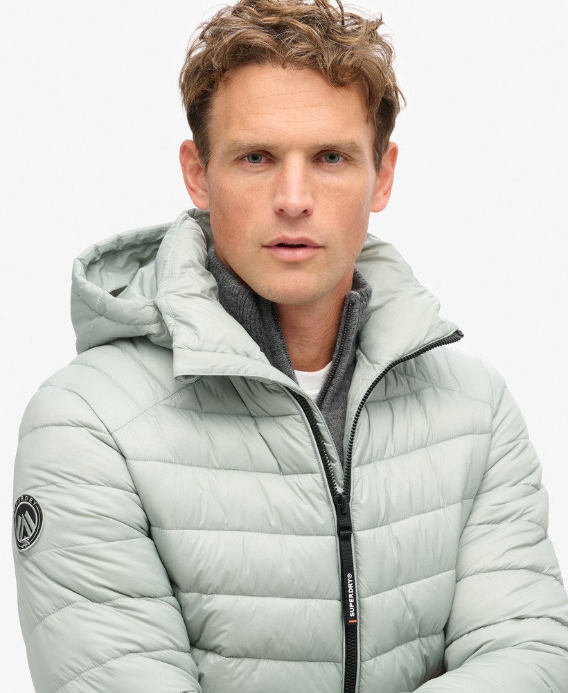 jaqueta acolchoada com capuz fuji sport na cor cinza pombo