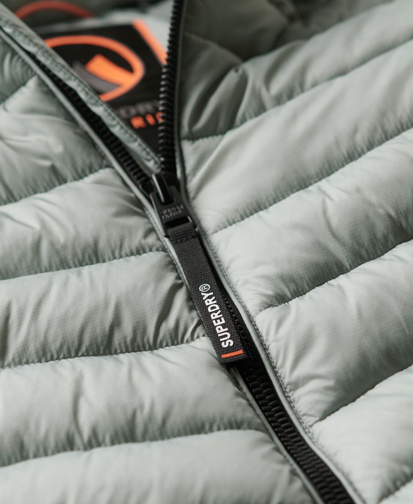jaqueta acolchoada com capuz fuji sport na cor cinza pombo