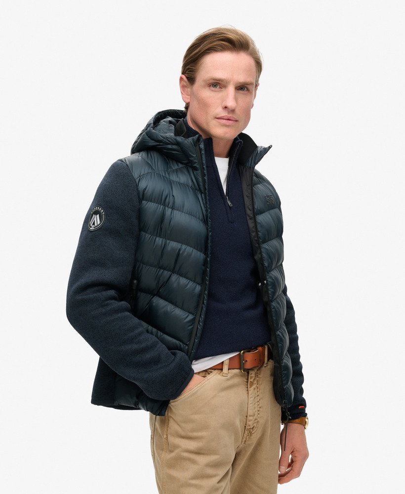 jaqueta híbrida storm com capuz em malha na cor eclipse navy mesl.