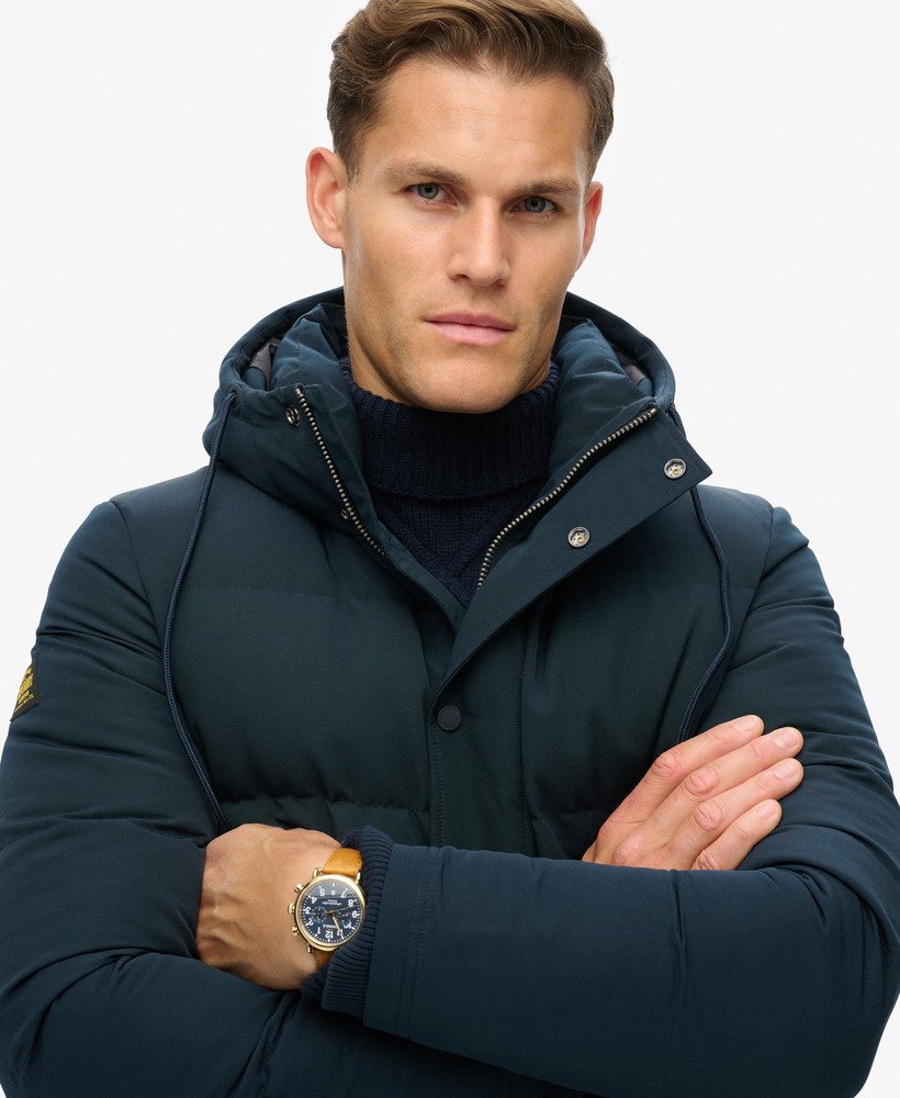jaqueta puffer curta com capuz everest na cor azul marinho eclipse.