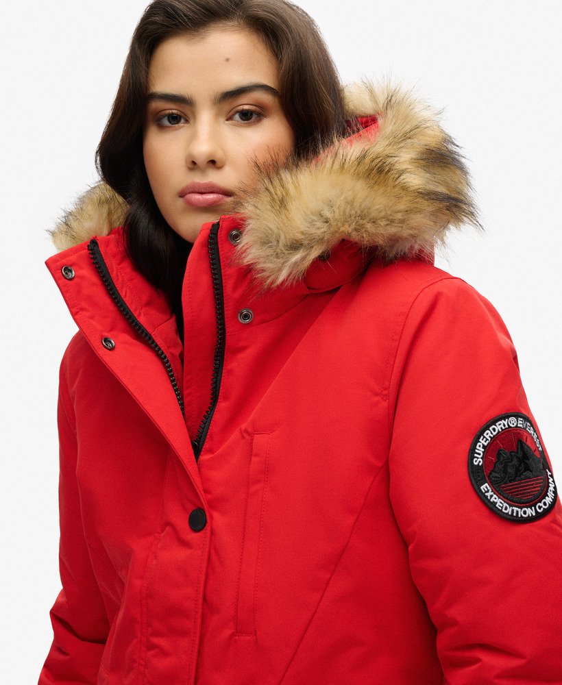 casaco parka com capuz everest em pele sintética na cor vermelho de alto risco.
