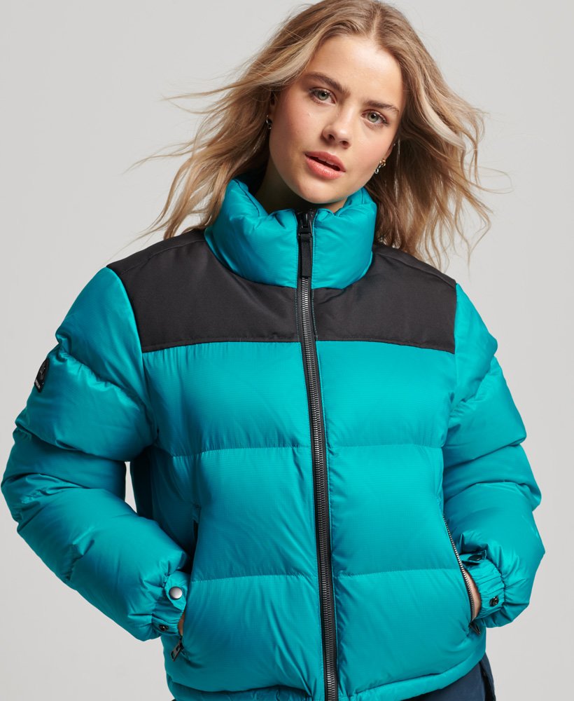 jaqueta puffer sportstyle code na cor verde tropical.