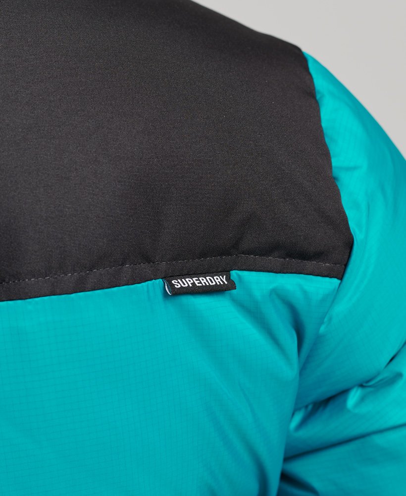 jaqueta puffer sportstyle code na cor verde tropical.