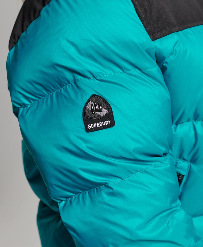 jaqueta puffer sportstyle code na cor verde tropical.