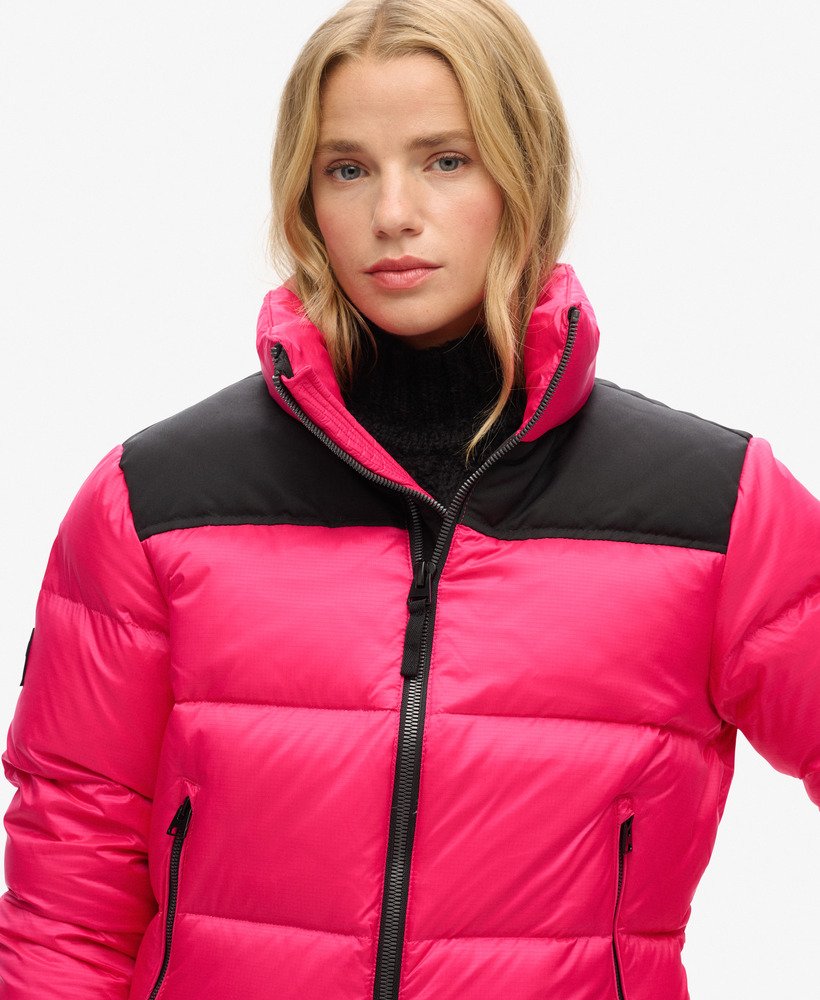 jaqueta puffer sportstyle code na cor rosa choque.