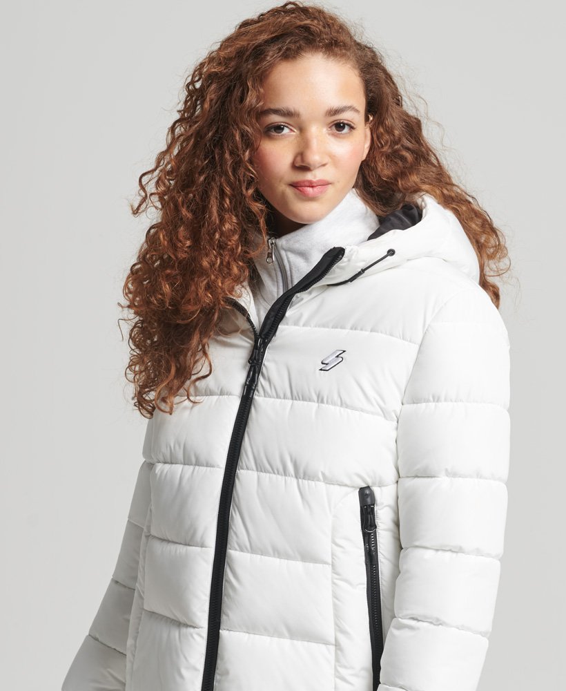 jaqueta puffer spirit sports com capuz na cor Óptica