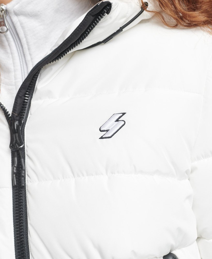 jaqueta puffer spirit sports com capuz na cor Óptica