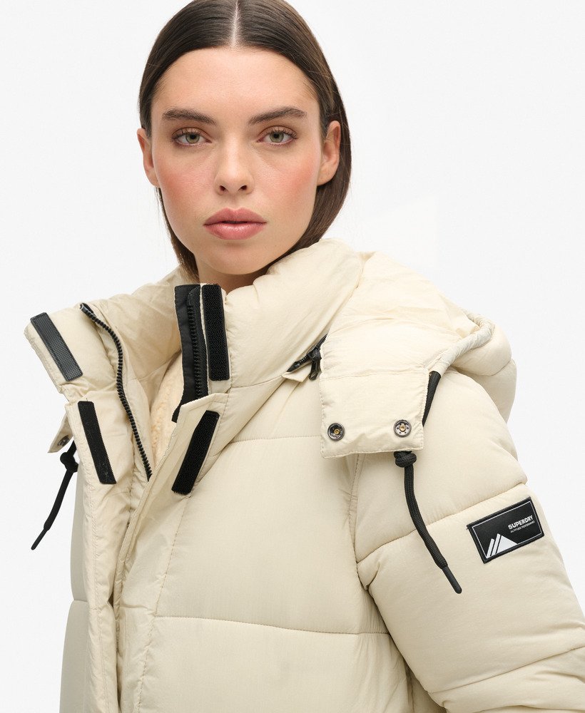 jaqueta puffer longa ripstop na cor pelicano.