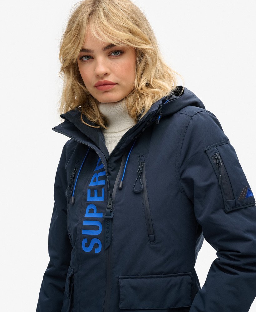 jaqueta corta-vento ultimate sd com capuz na cor nordic chrome navymazarine blue