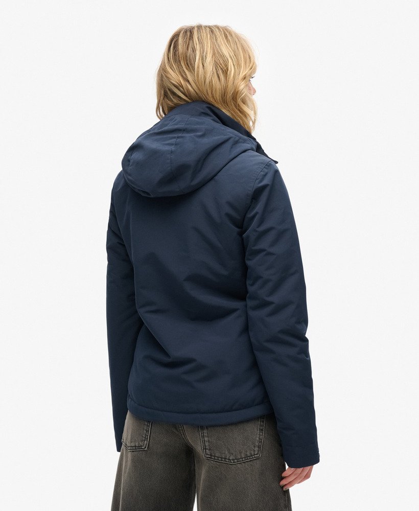 jaqueta corta-vento ultimate sd com capuz na cor nordic chrome navymazarine blue