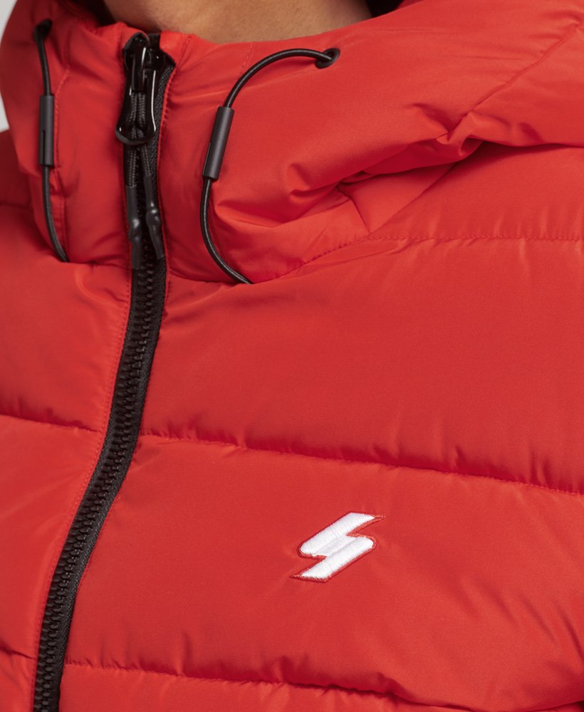jaqueta puffer spirit sports com capuz na cor vermelho vibrante