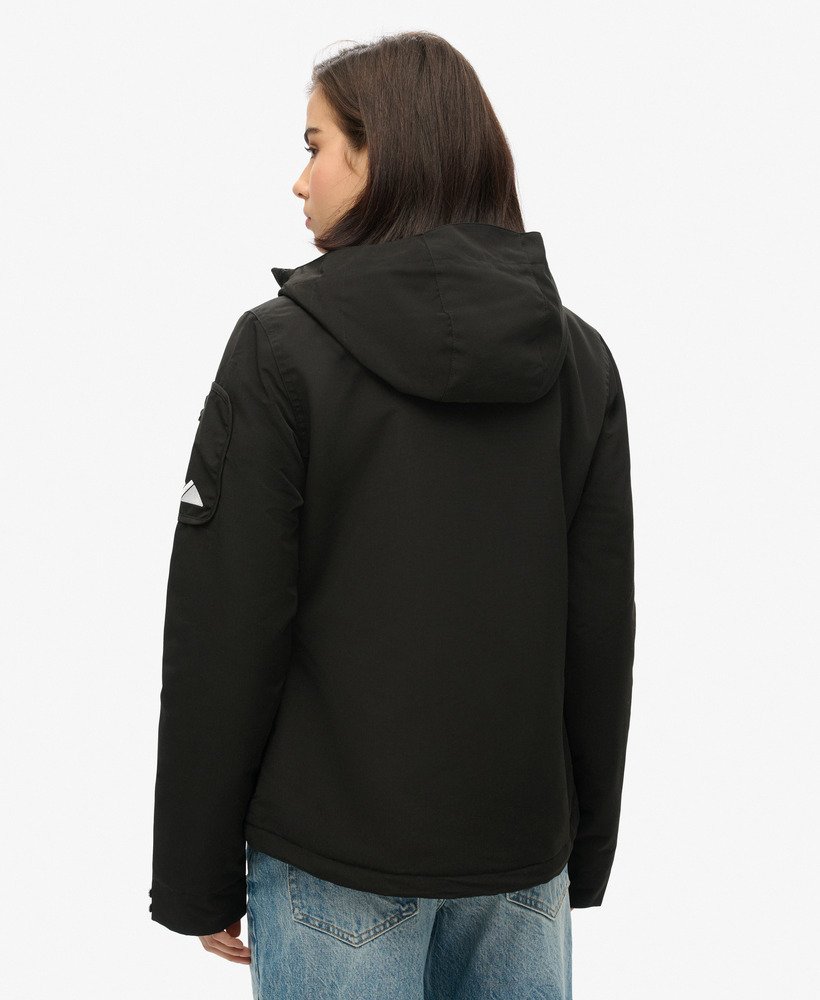 jaqueta corta-vento ultimate sd com capuz na cor preto jatoóptico.