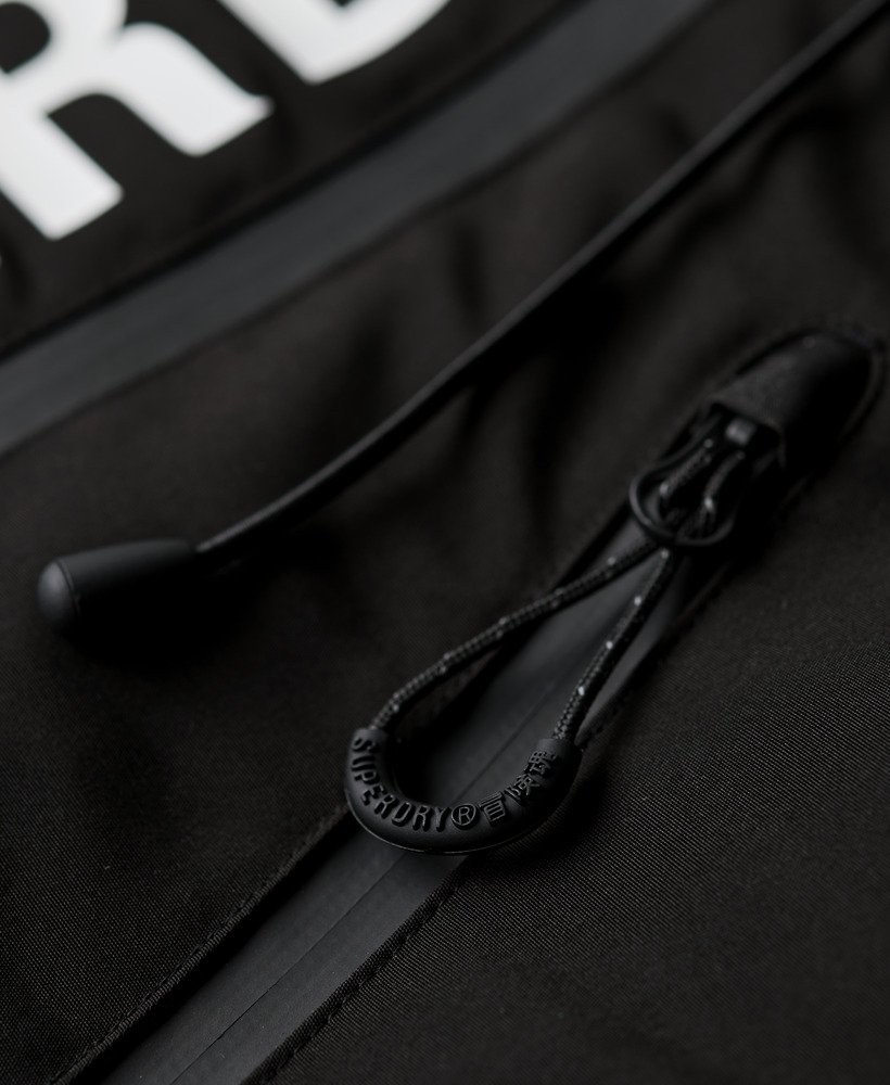 jaqueta corta-vento ultimate sd com capuz na cor preto jatoóptico.