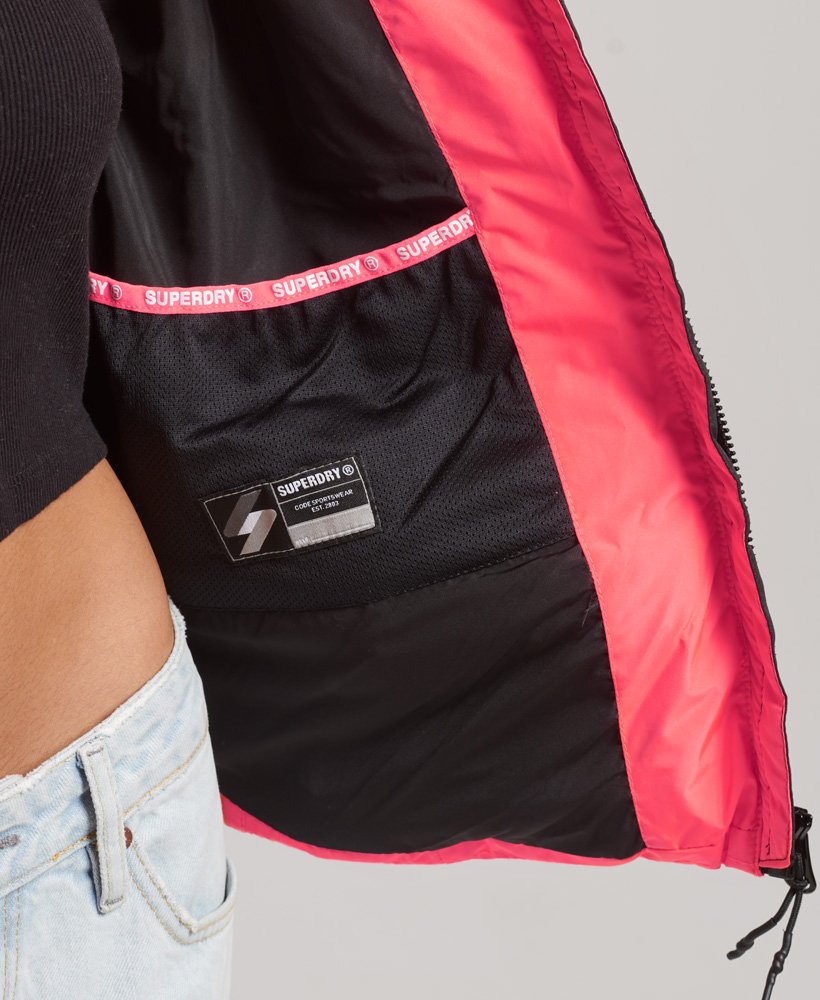 jaqueta puffer spirit sports com capuz na cor hyper fire coral