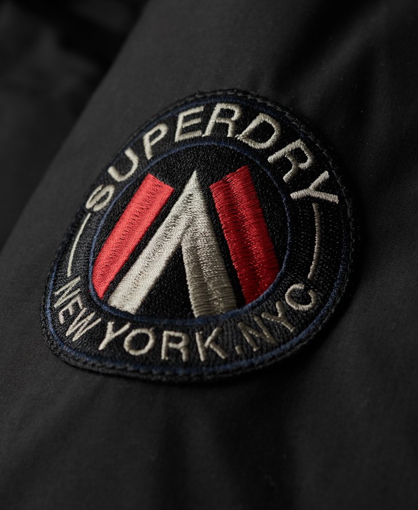 jaqueta parka acolchoada city na cor preta.